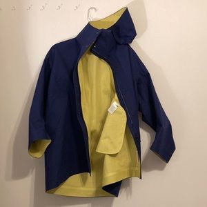 Brand new Uniqlo raincoat with tags never worn